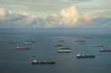 Cargo ships wait to transit the Panama Canal in Panama City, Friday, June 28, 2024